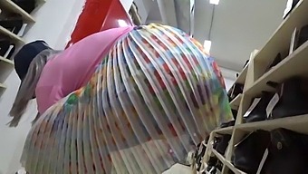 A Voyeur Captures A Tantalizing Display Of Foot Fetish And Skirt Peeking In A Shoe Store