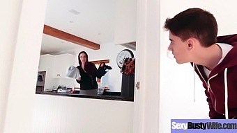 A Busty Housewife Engages In Intense Sexual Activity In This Explicit Video