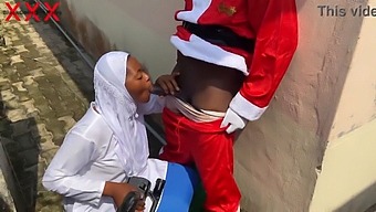 Enjoy A Naughty Christmas Encounter With A Seductive Hijab-Wearing Vixen And Santa